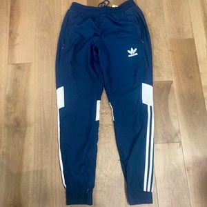 Adidas navy blue windbreaker pants. Size small